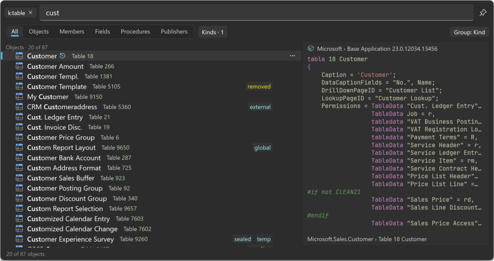 Prism for AL Universal Search with a k:table pill, tables matching cust, and the source preview of the selected table